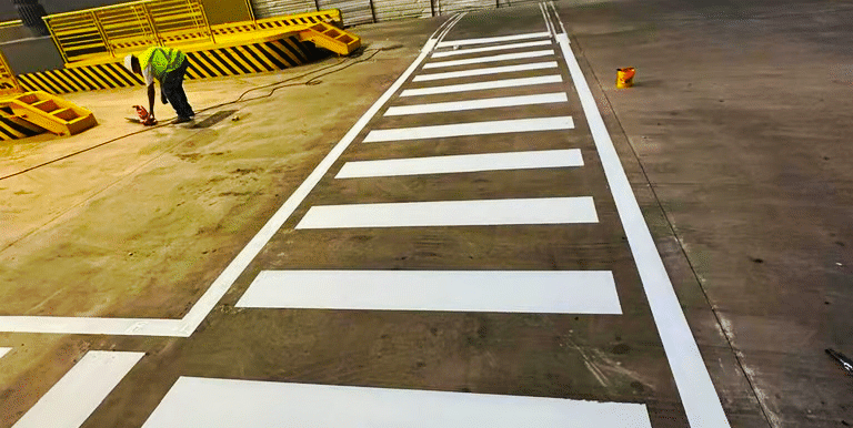 Pintura e sinalização industrial executada pela Angelo Pinturas na unidade FEMSA / Coca-Cola